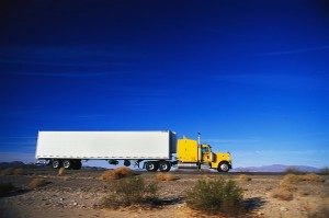 trucking rig against blue sky