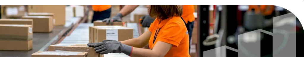 Factory workers packaging on a production line