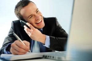 business person making a phone call