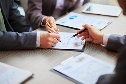 business people negotiating a line of credit
